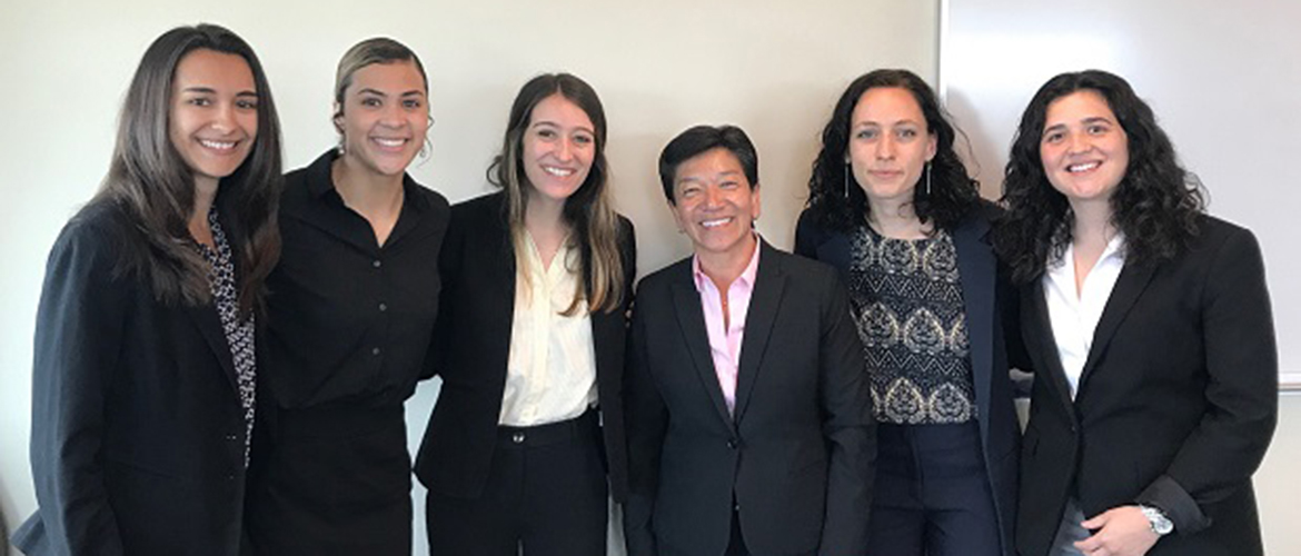 Washington Supreme Court Justice Mary Yu (center) meets with the 2019 recipients of the Calhoun Family Fellowship.