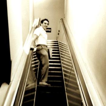 The escalator that led to the law library was a fixture of the Norton Clapp Law Center, which was formerly a department store.