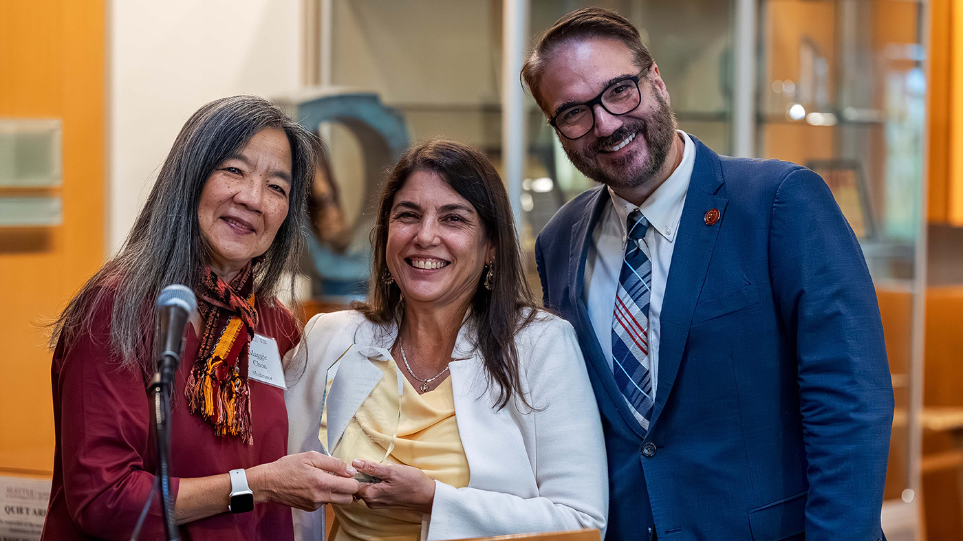 Professor Margaret Chon, TILE awardee Catherine Romero '96, Dean Anthony E. Varona